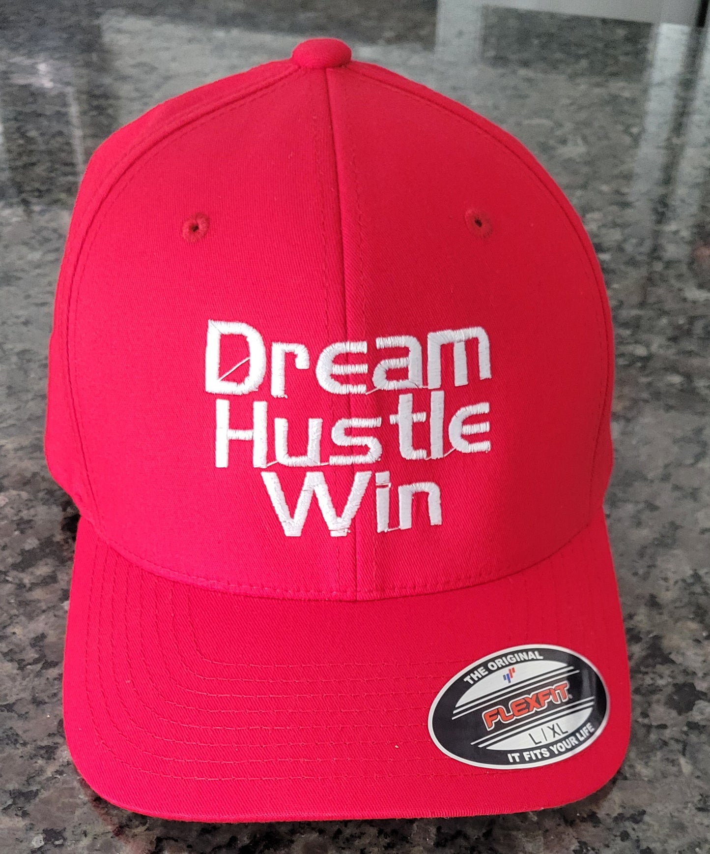 Dream, hustle, win fitted cap